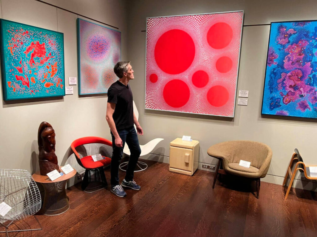 Travel Lemming founder, Nate Hake admiring the art displayed in Kirkland Museum of Fine & Decorative Art