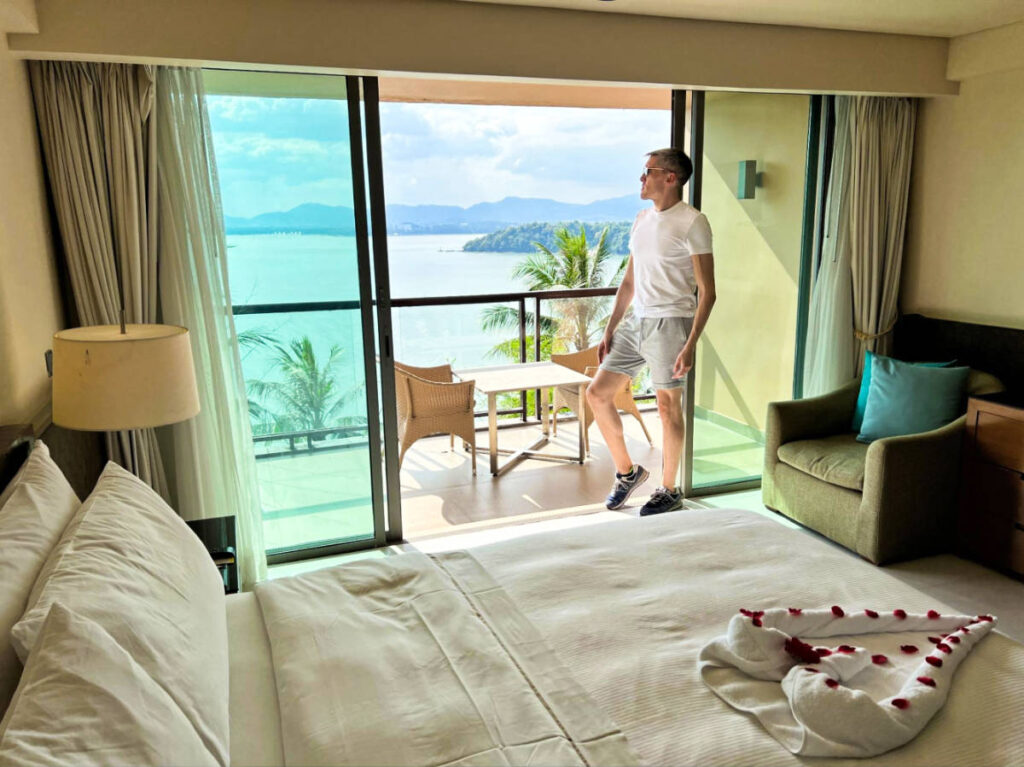 Travel Lemming founder Nate Hake admiring the view from the terrace of Westin Siray Bay