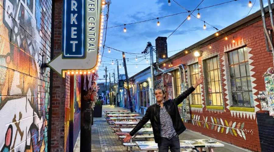 Nate posing for a photo at the RiNo District