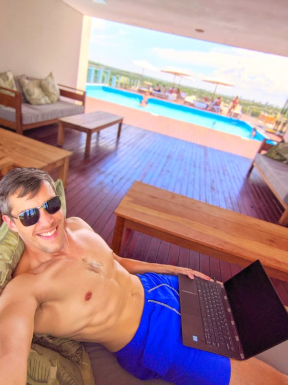 Travel Lemming founder Nate Hake, relaxing with his computer in Puerto Iguazú