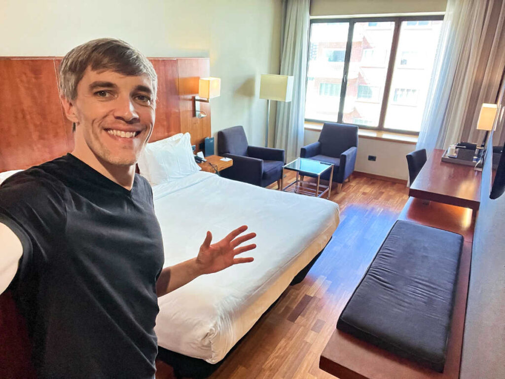Travel Lemming founder Nate Hake inside the room of AC Hotel Aitana