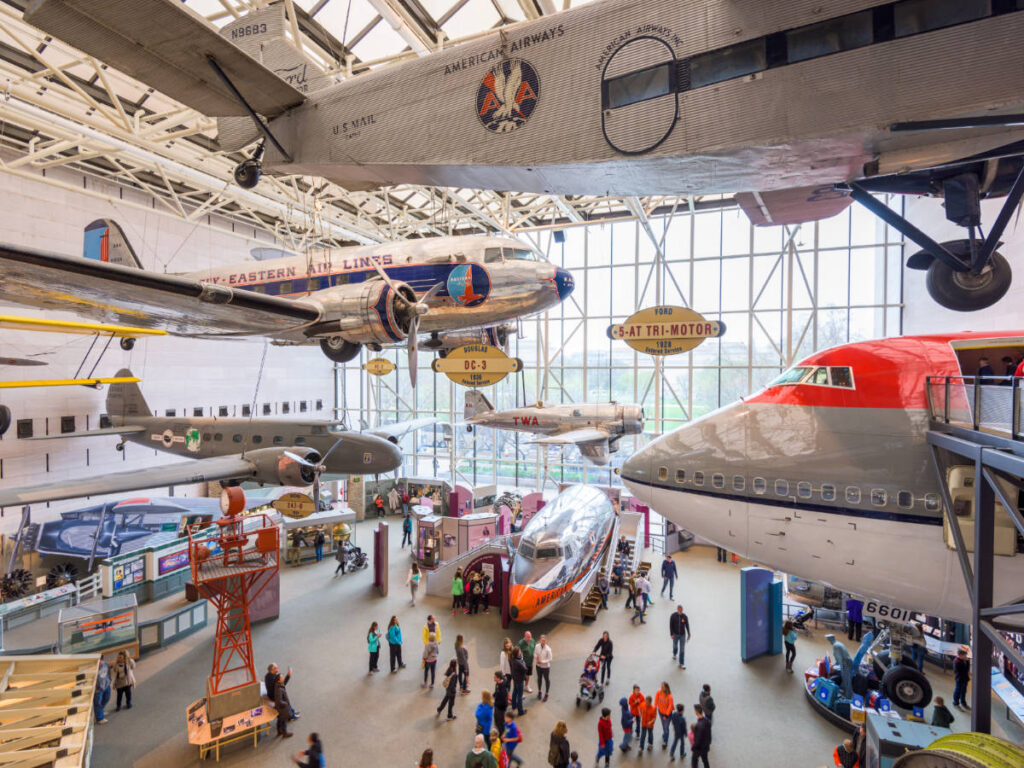 People admiring the aircrafts displayed inside the Smithsonian’s National Air and Space Museum
