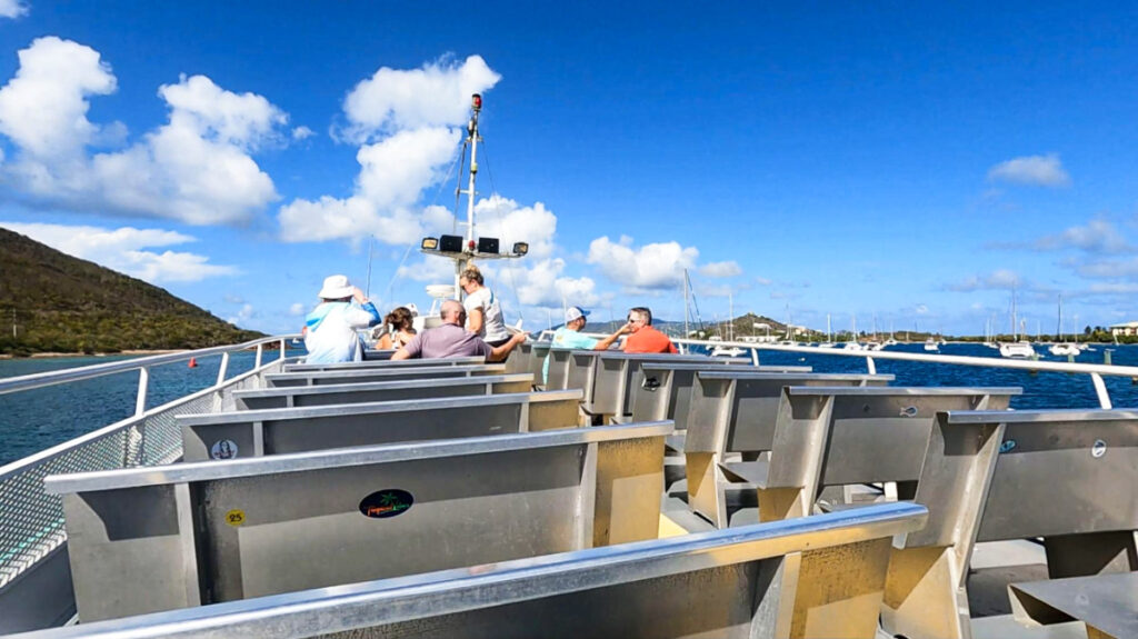 People enjoying the view from the top deck of the Native Son Ferry