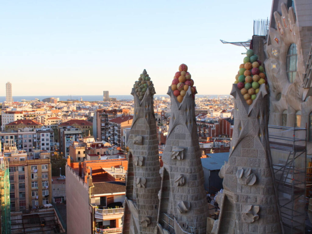 Closeup view of the Nativity towers and the overlooking view of Barcelona