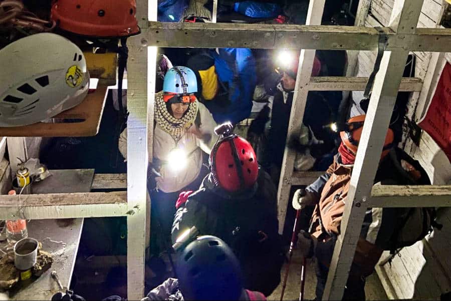 People with full necessary gears at the dark Iztaccihuatl refugio
