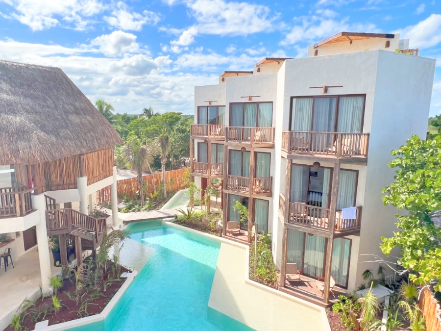 Pool and guest suites at Nerea beachfront hotel Tulum