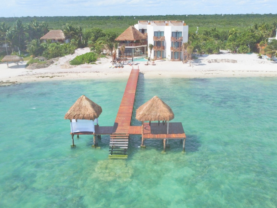 Drone view of dock in front of Nerea Hotel