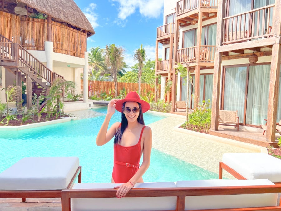 View of Clara from Travel Lemming lounging near the pool at the Nerea boutique hotel