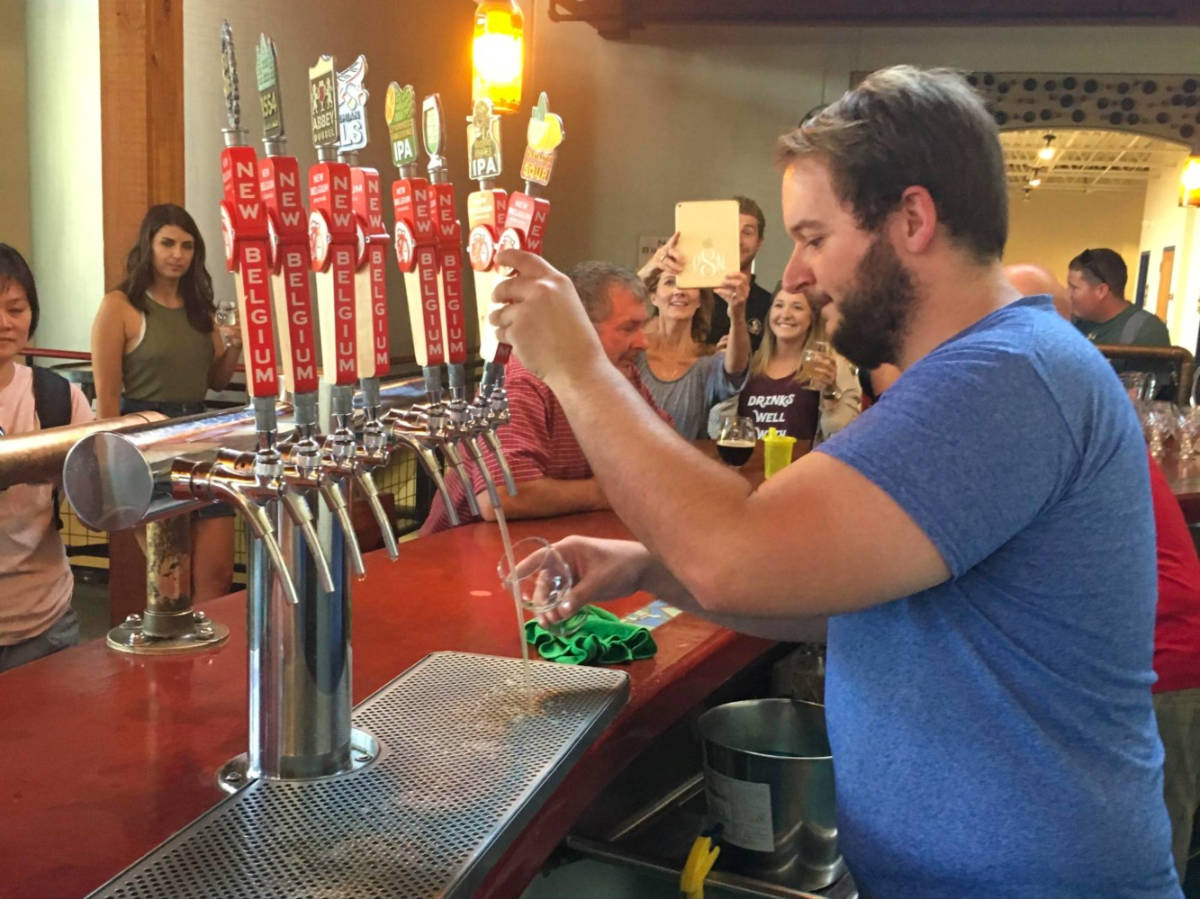Travel Lemming editor Elizabeth’s husband at New Belgium Brewery