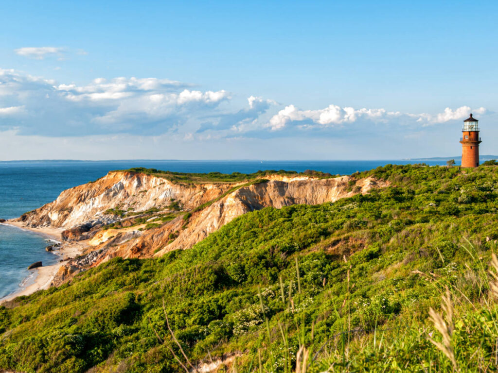 A lighthouse near the cliff at New England Coast in Martha’s Vineyard