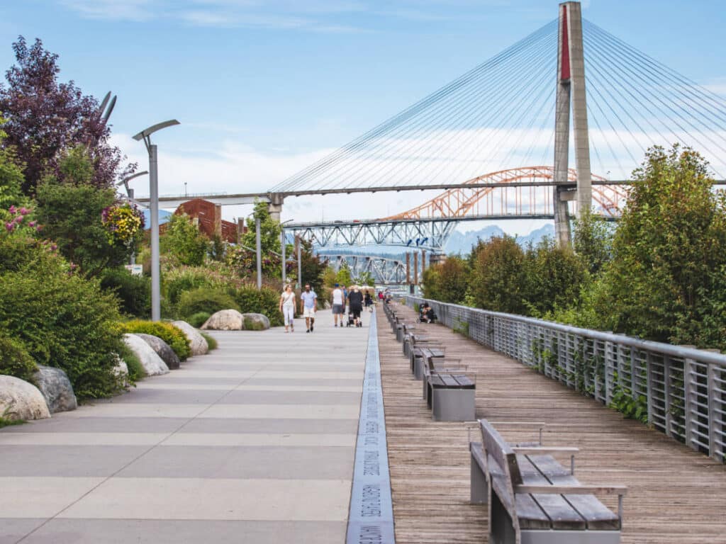 People walking on a boardwalk in New Westminster