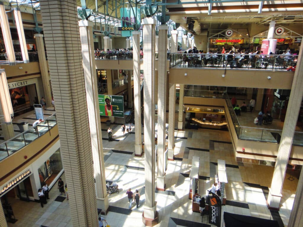 View of people inside the Newport Centre Mall