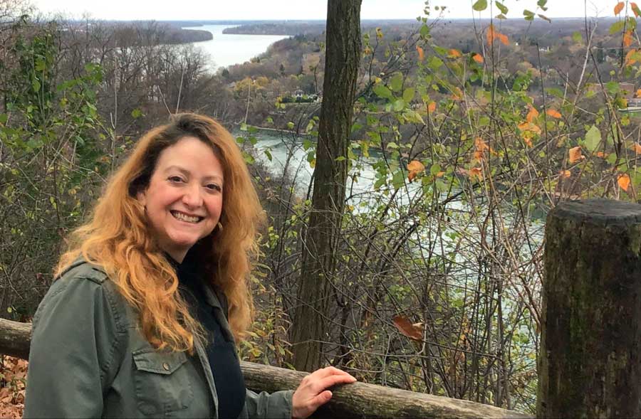 The author smiling for a photo in Niagara Parkway