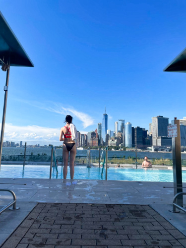 The author Niamh Hayes enjoying the Lower Manhattan view from the pool area