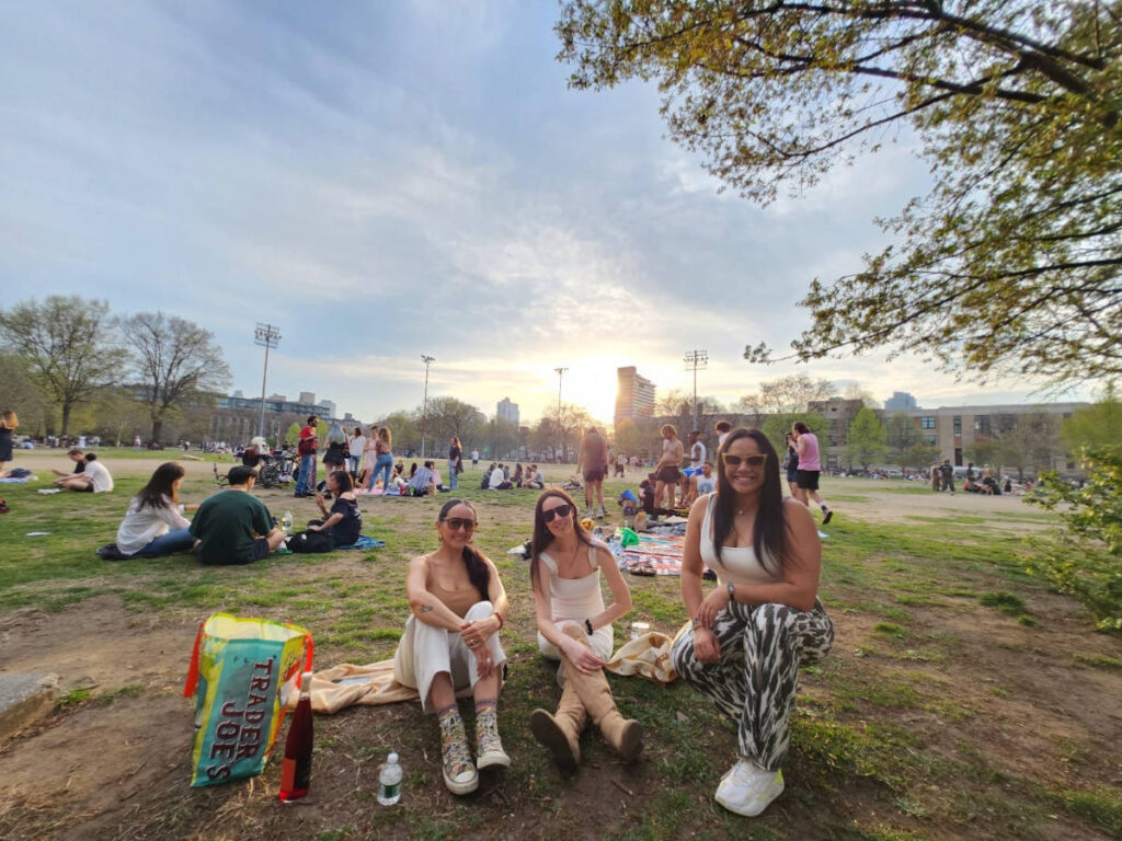 The author Niamh Hayes and her friends chilling with the crowd at McCarren Park