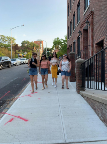 The author Niamh Hayes and her friends walking in Downtown, Brooklyn