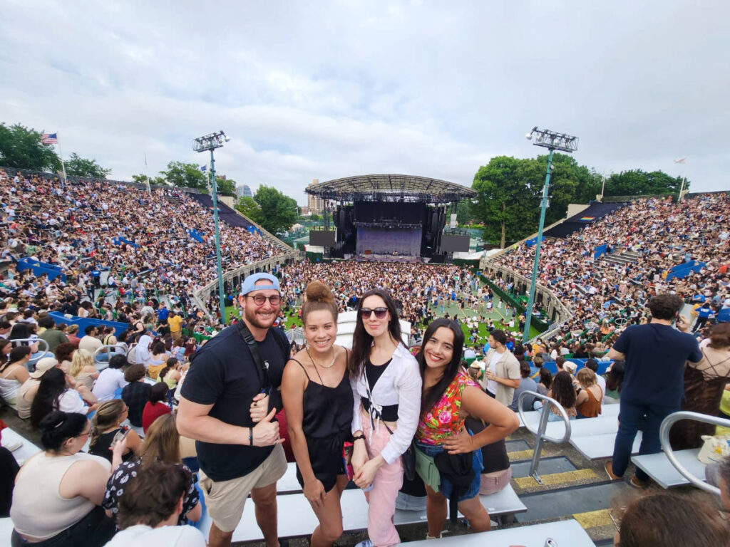 The author Niamh Hayes and her friends, posing for a photo at the Forest Hills Stadium