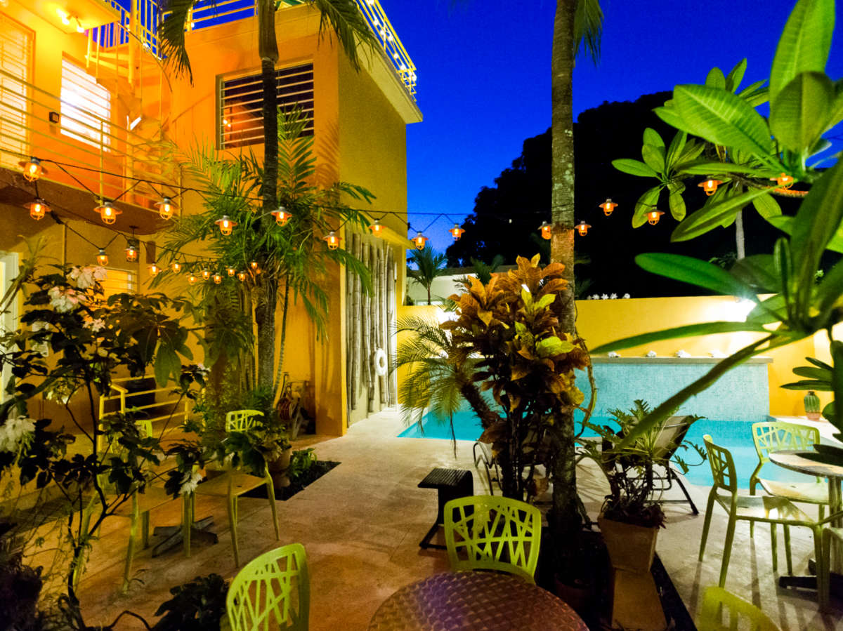 Night view of the pool and courtyard area