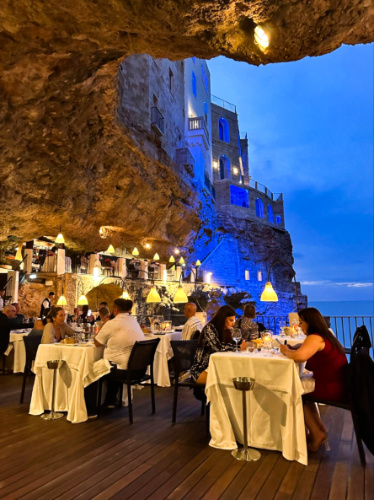 Night time view from the dining terrace of Grotta Palazzese