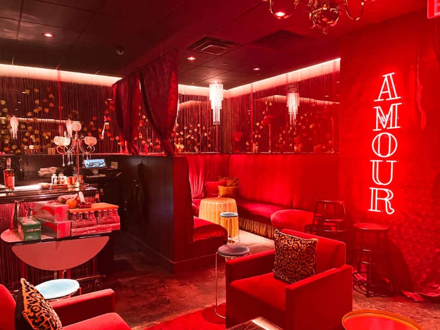 View inside the bar area illuminated with red lights in Noelle