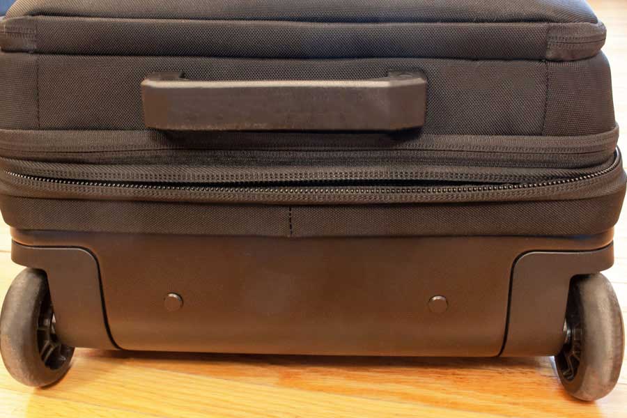 Close up view of the tamper resistant zippers of Nomatic Navigator Carry On