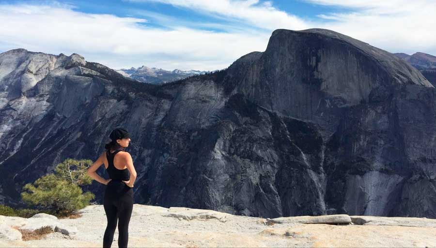 The author at the top of North Dome in Yosemite National Park