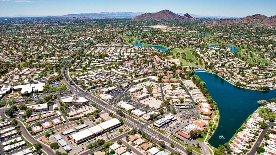 Aerial view of the Greenbelt in Scottsdale with a mountain and cityscape view in the distance