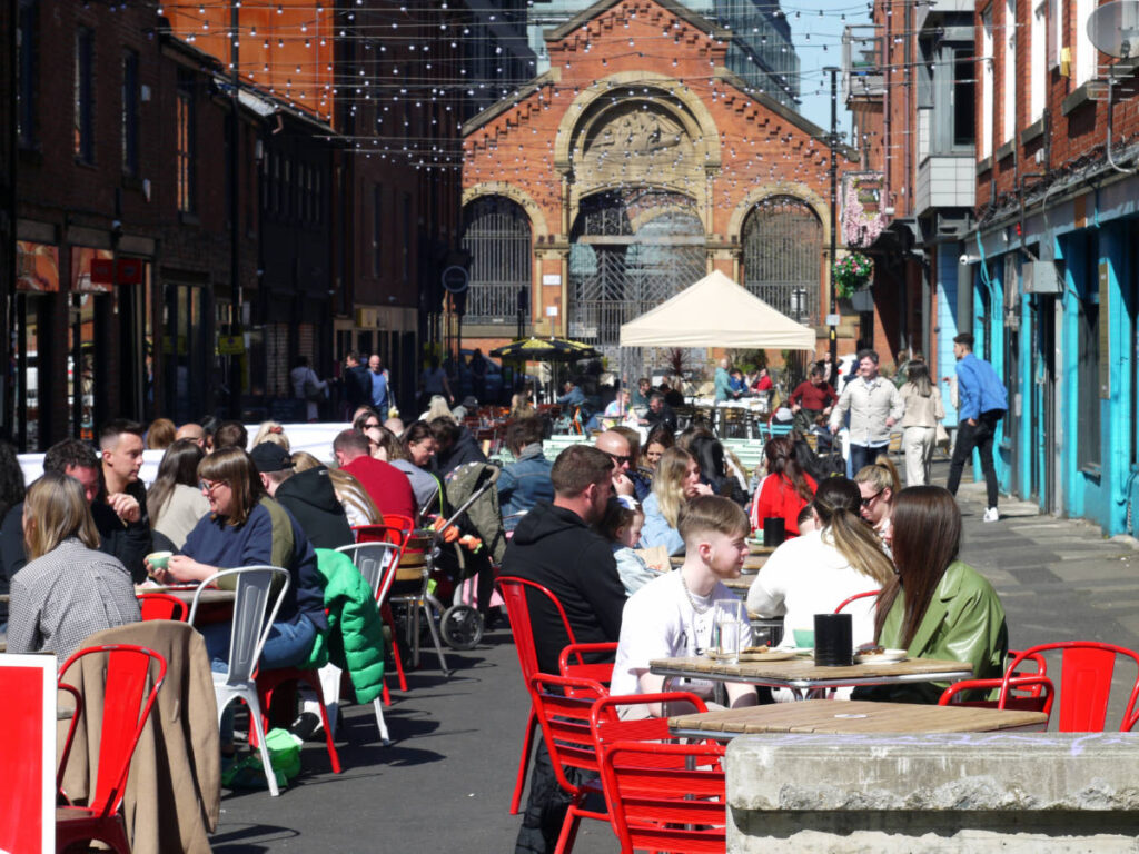 People enjoying their day on cafes and restaurants in Northern Quarter