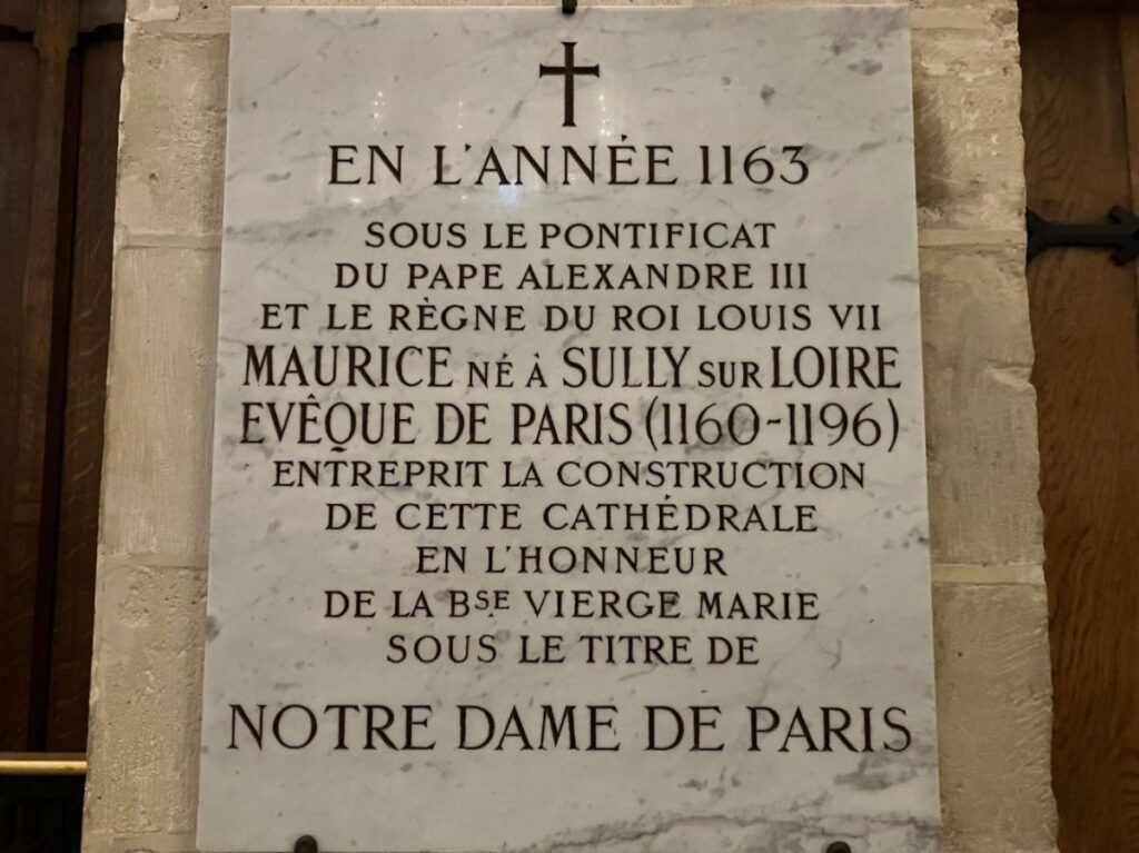A signage explaining Notre Dame's history