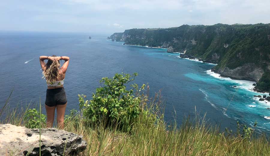 The author admiring the amazing view from Nusa Penida Island