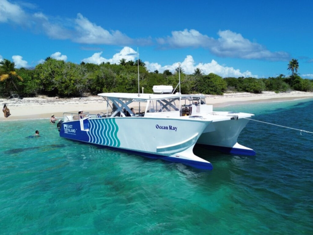 An Ocean Ray Catamaran on the clear water