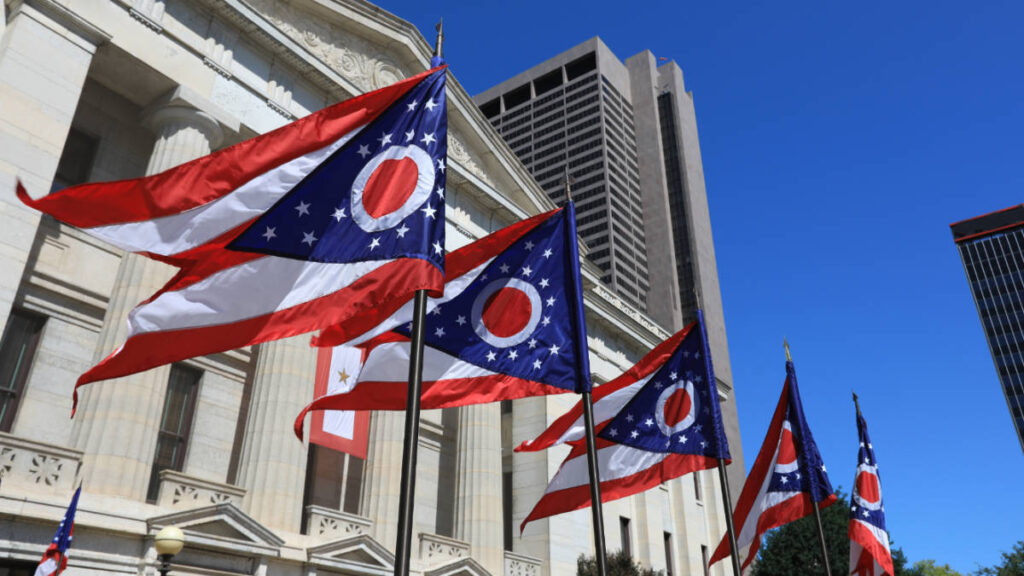 Ohio state flags outside the Ohio Statehouse