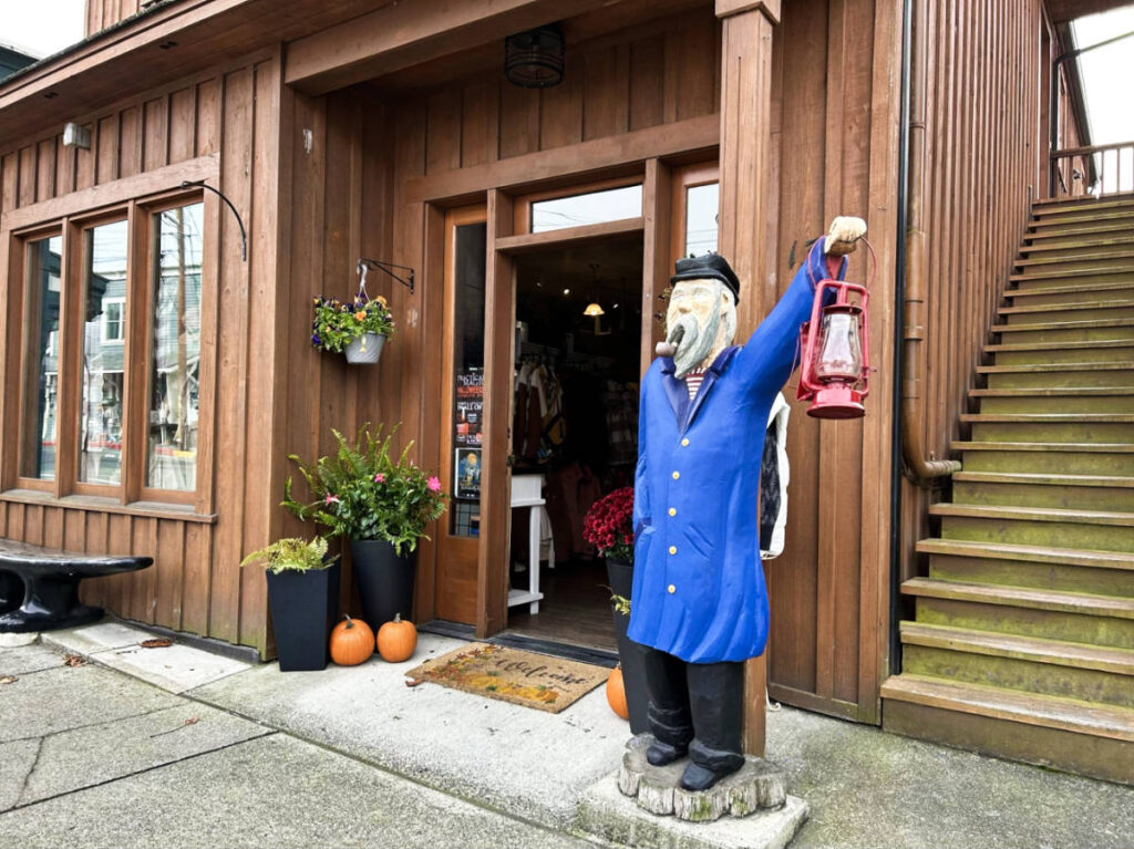 An old sailor statue outside a shop in downtown Coupeville