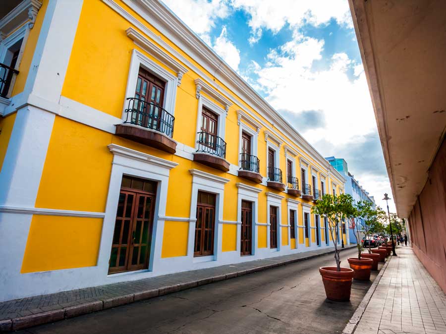 A yellow building in Old Town City in Ponce