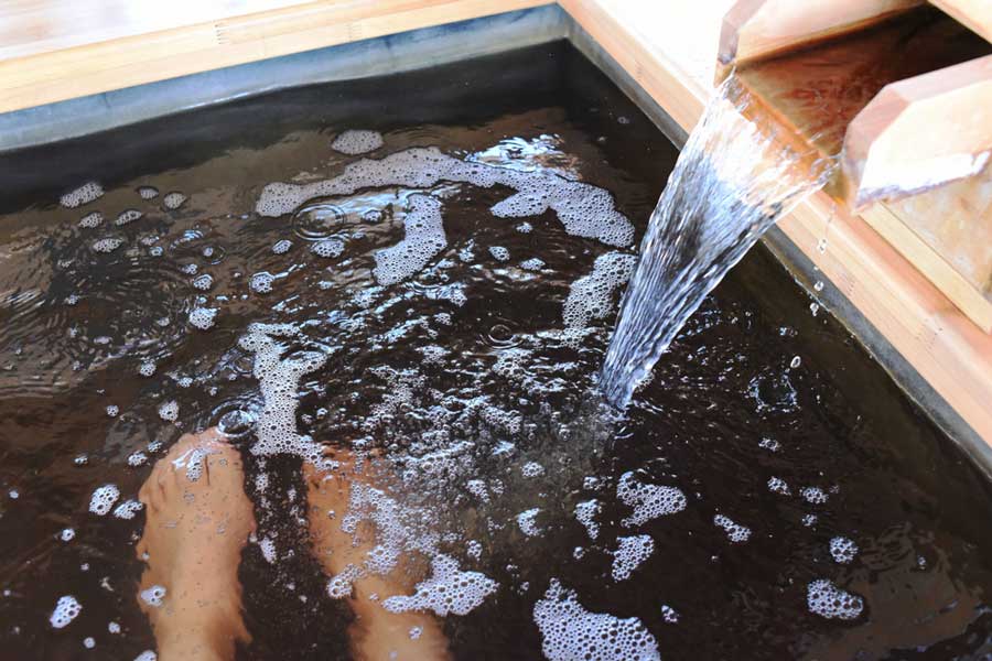 A feet soak on water in Old Town Hot Springs