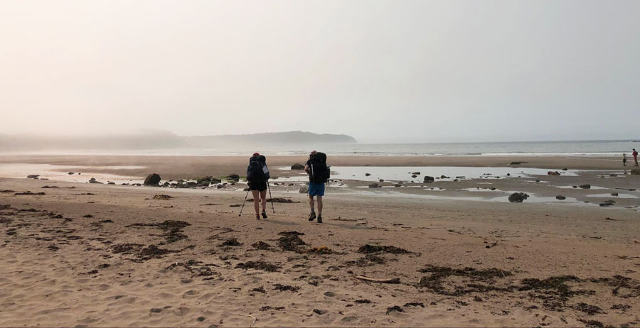 View of two people backpacking along the Olympic Peninsula