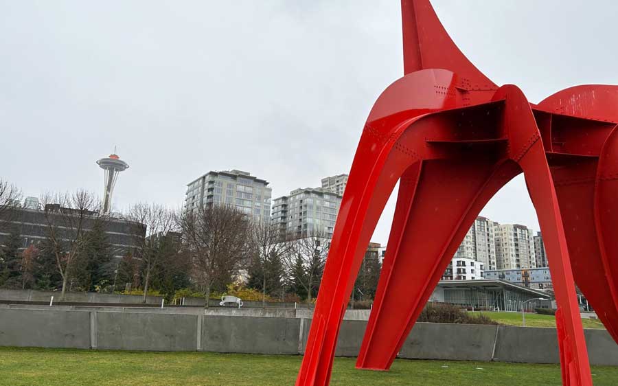 A sculpture and the Space Needle from afar in Olympic Sculpture Park