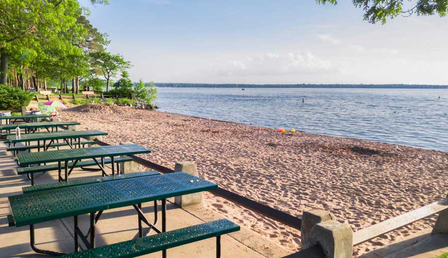 Chairs and tables near the Oneida Lake