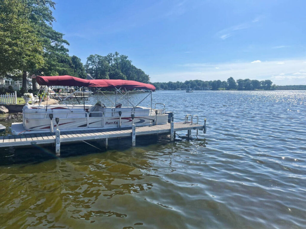 A boat on a dock in Orange Lake