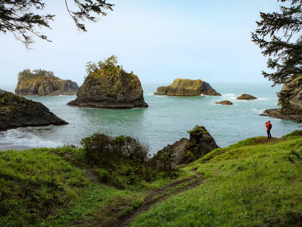 A man admiring the view in Oregon Coast Trail