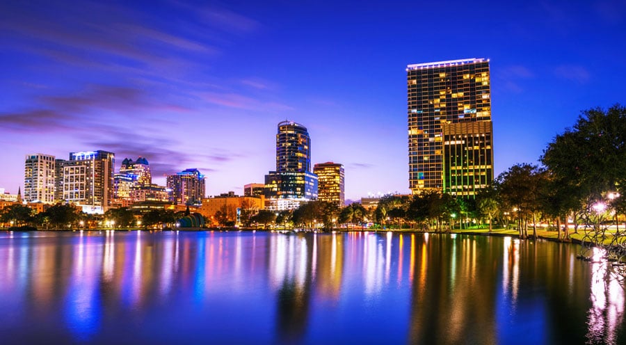 View of the skyline at night and the Lake Eola in Orlando
