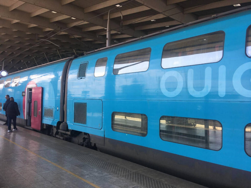 A French OuiGo Train stops on a train station