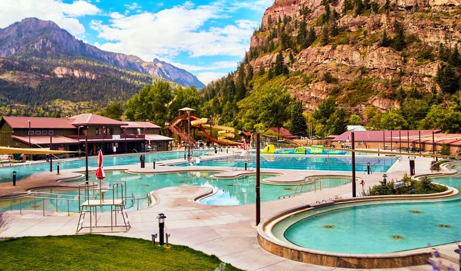 View from the Ouray Hot Springs Pool under the clear blue sky in Colorado