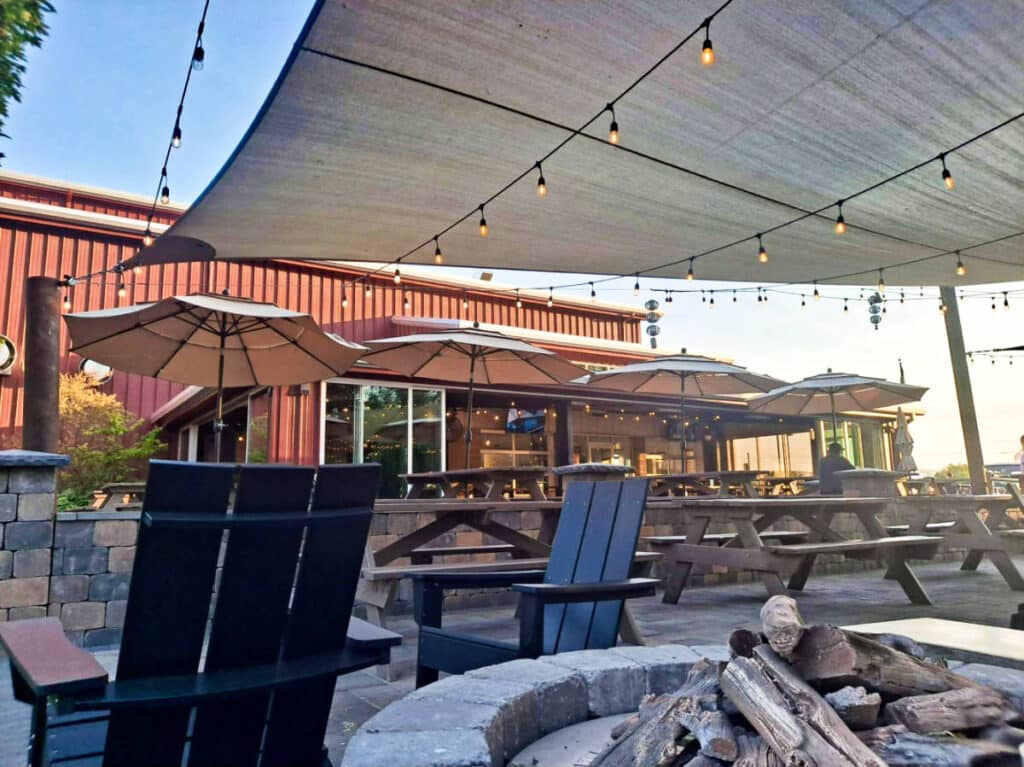 View of the cozy outdoor seating area in Bale Breaker Brewing Company