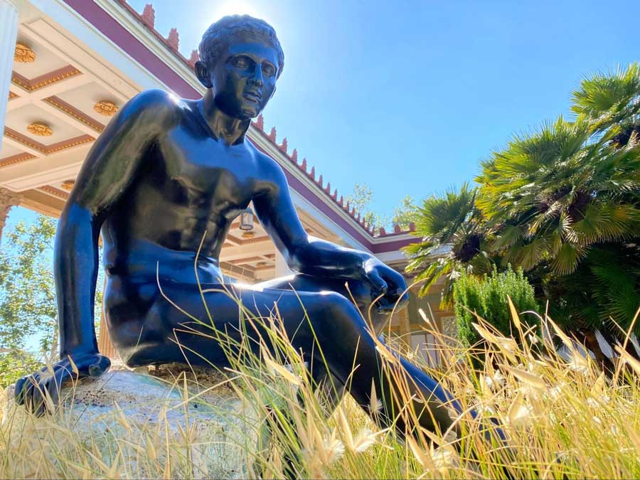 View of a statue at the Outer Peristyle in Getty Villa