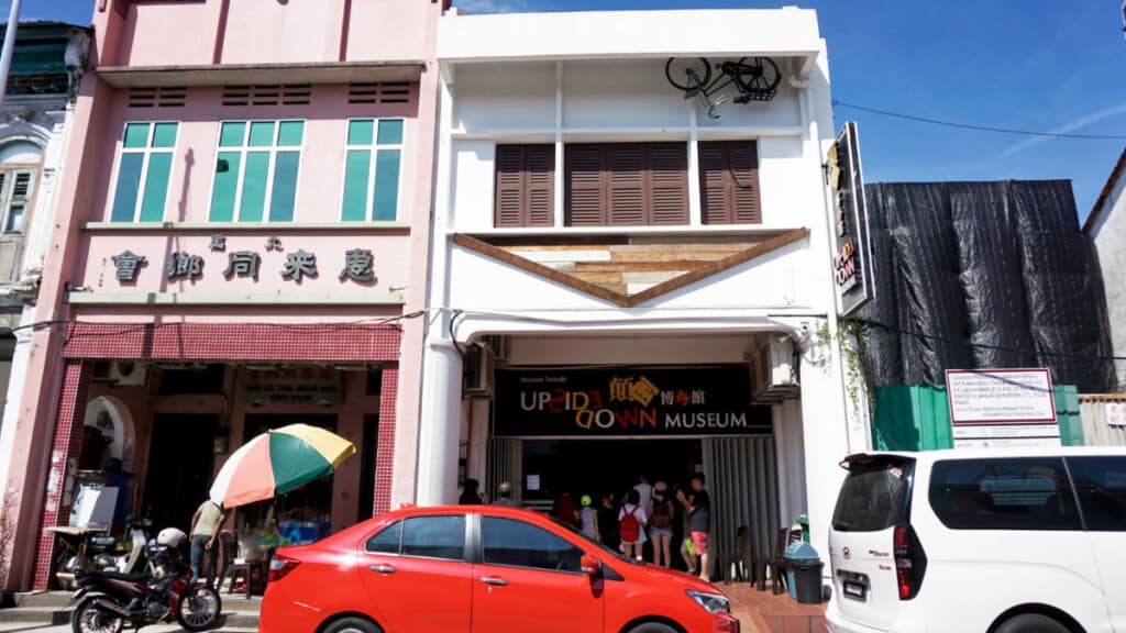 View of the parked cars outside the Upside Down Museum