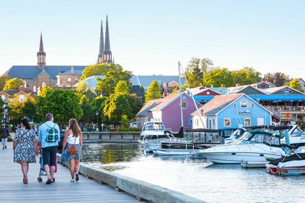 Family walking in the harbor of Prince Edward Island