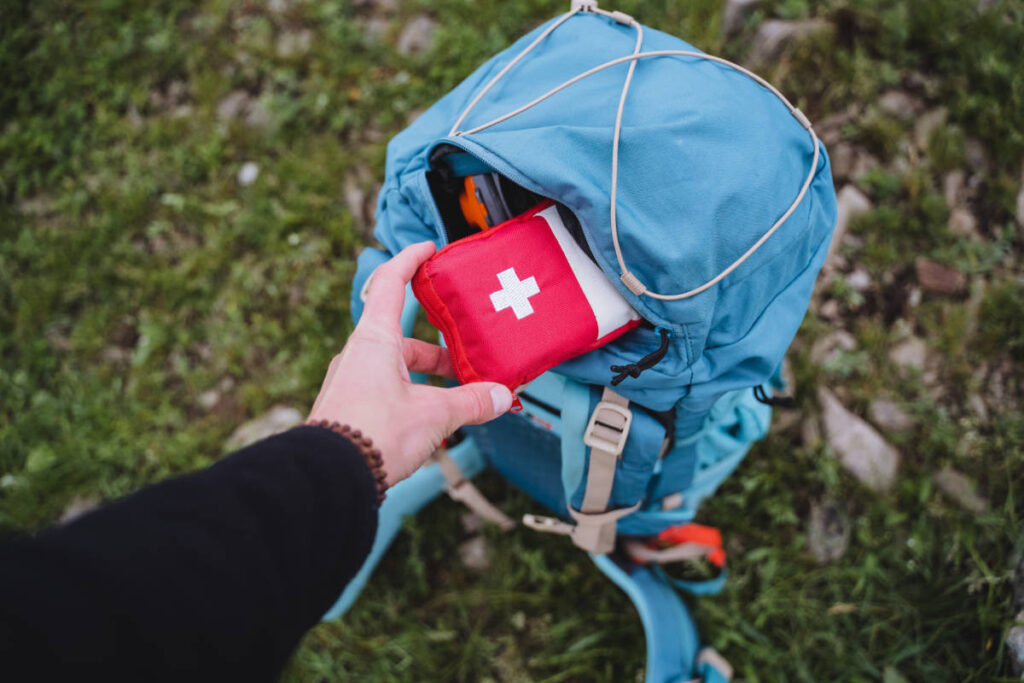 Holding a bag of first aid kit