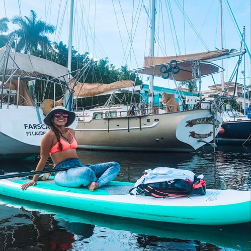View of the author's wife having fun in paddle boarding
