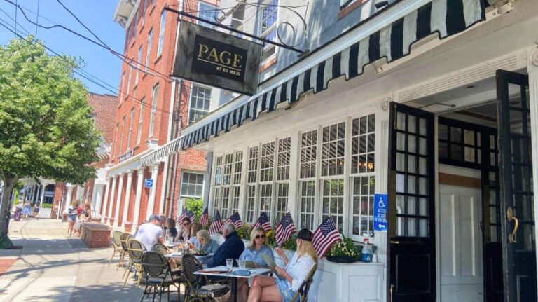 View of the entrance and outdoor dining at Page at 63 Main